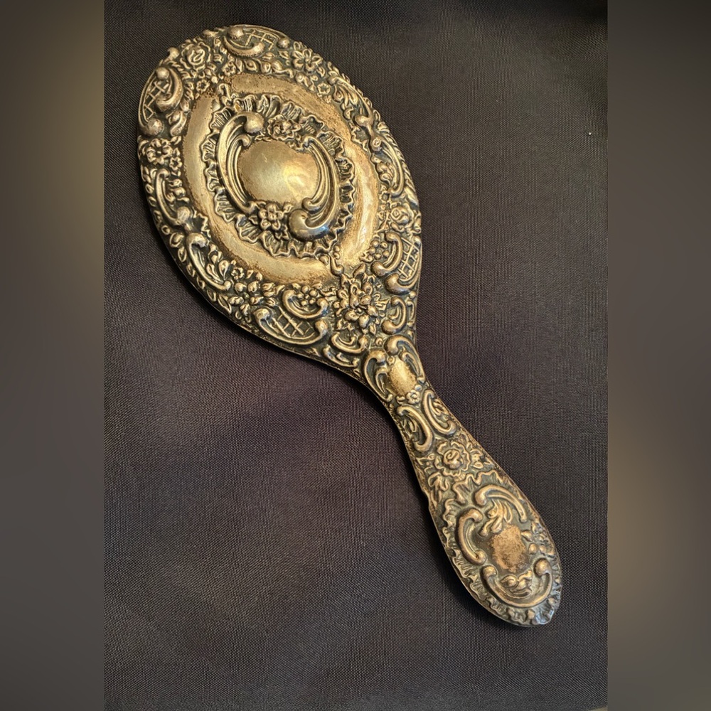 Vintage Ornate silver plate hand mirror